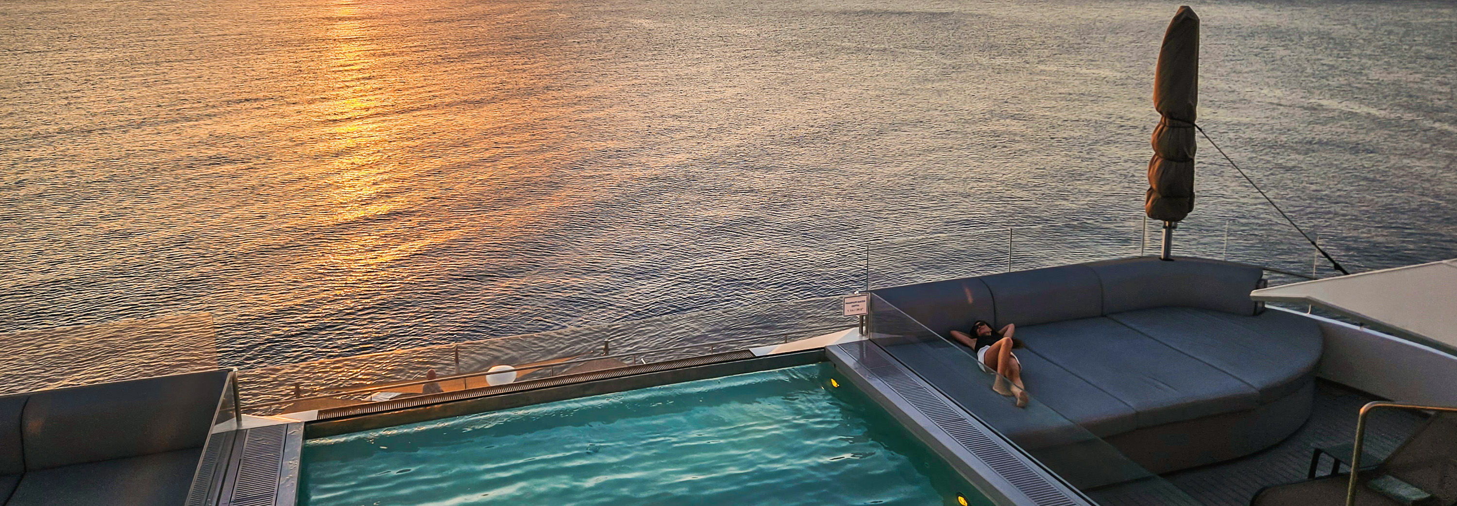 Take in the dramatic sunsets from the Pool Deck